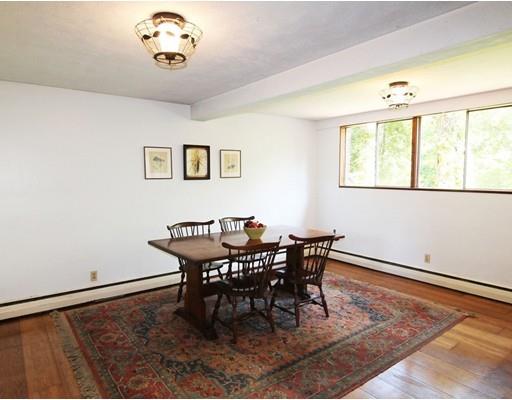 16 Foster Road Lexington, MA 02421 - Photo 7 of 21 a view of a dining room with furniture window and outside view