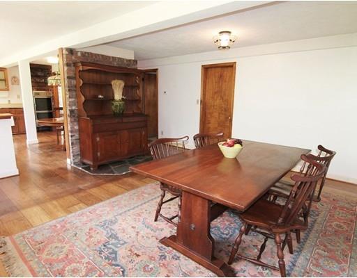 16 Foster Road Lexington, MA 02421 - Photo 8 of 21 a view of a dining room with furniture