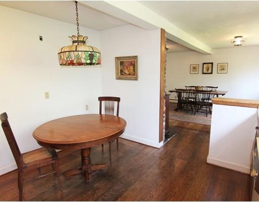 16 Foster Road Lexington, MA 02421 - Photo 10 of 21 a view of a dining room with furniture wooden floor and a chandelier