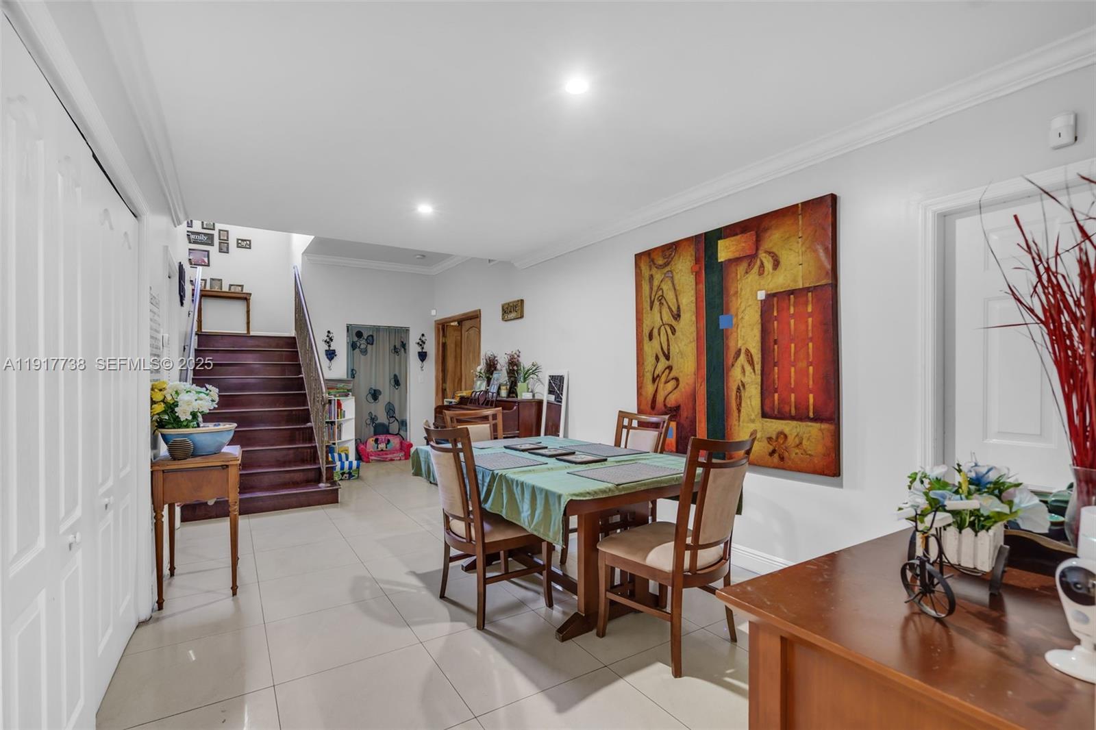 3135 Southwest 80th Avenue Miami, FL 33155 - Photo 23 of 65 a view of a dining room with furniture window and wooden floor