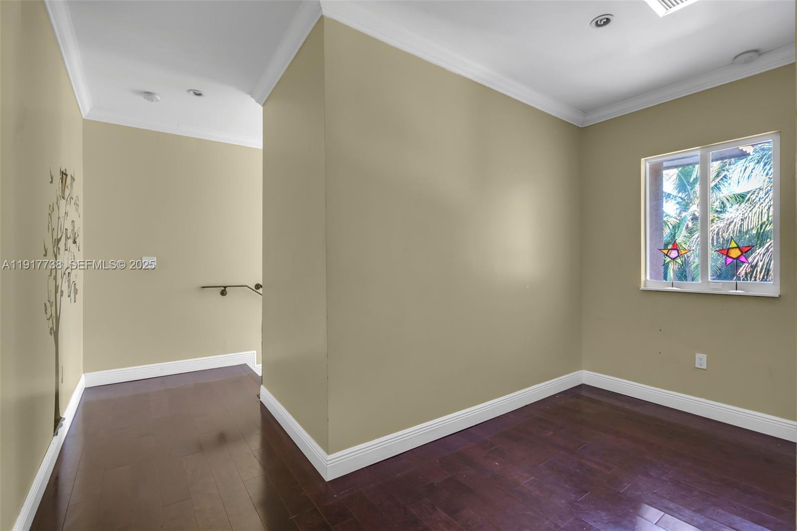 3135 Southwest 80th Avenue Miami, FL 33155 - Photo 37 of 65 a view of an empty room with wooden floor