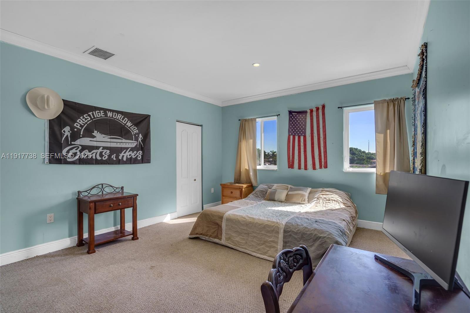 3135 Southwest 80th Avenue Miami, FL 33155 - Photo 38 of 65 a bedroom with a bed and a couch