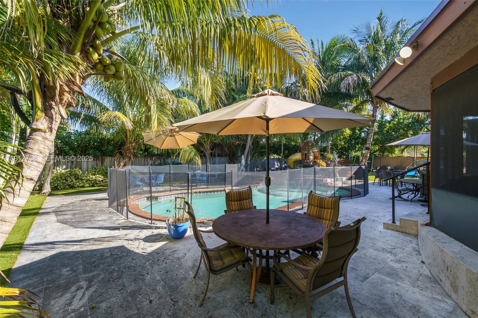 3135 Southwest 80th Avenue Miami, FL 33155 - Photo 46 of 65 a view of backyard with seating space and wooden fence