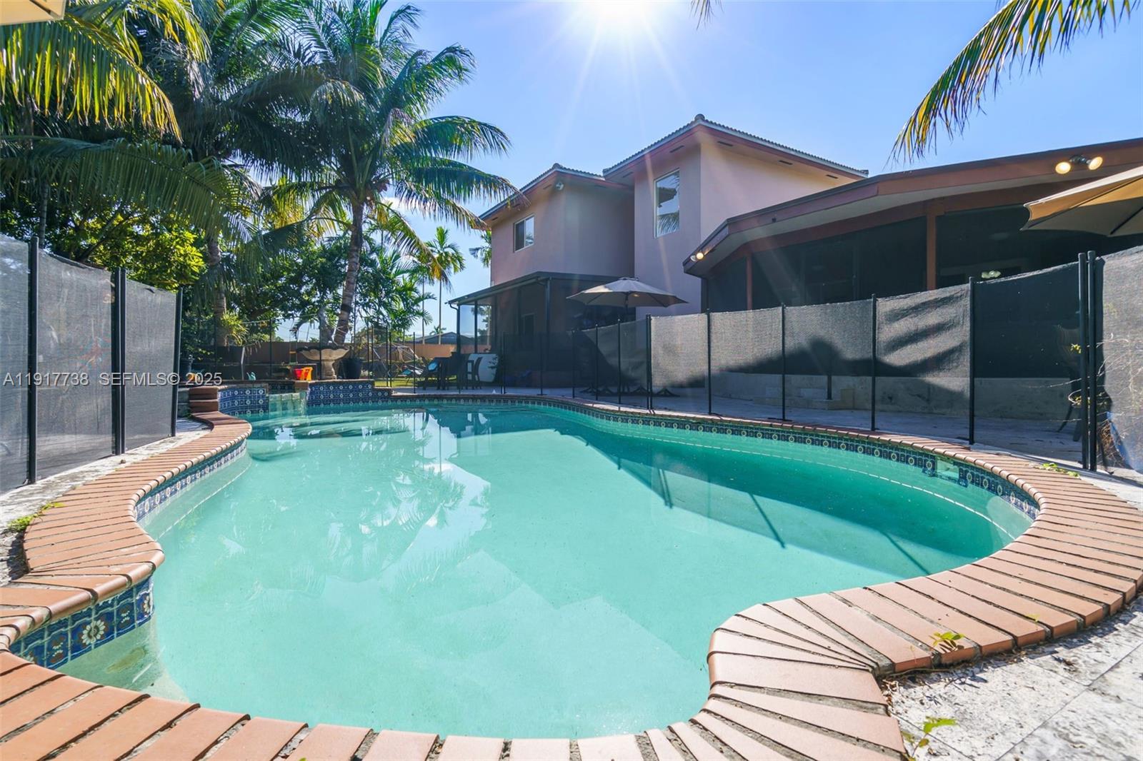 3135 Southwest 80th Avenue Miami, FL 33155 - Photo 53 of 65 a view of a house with swimming pool