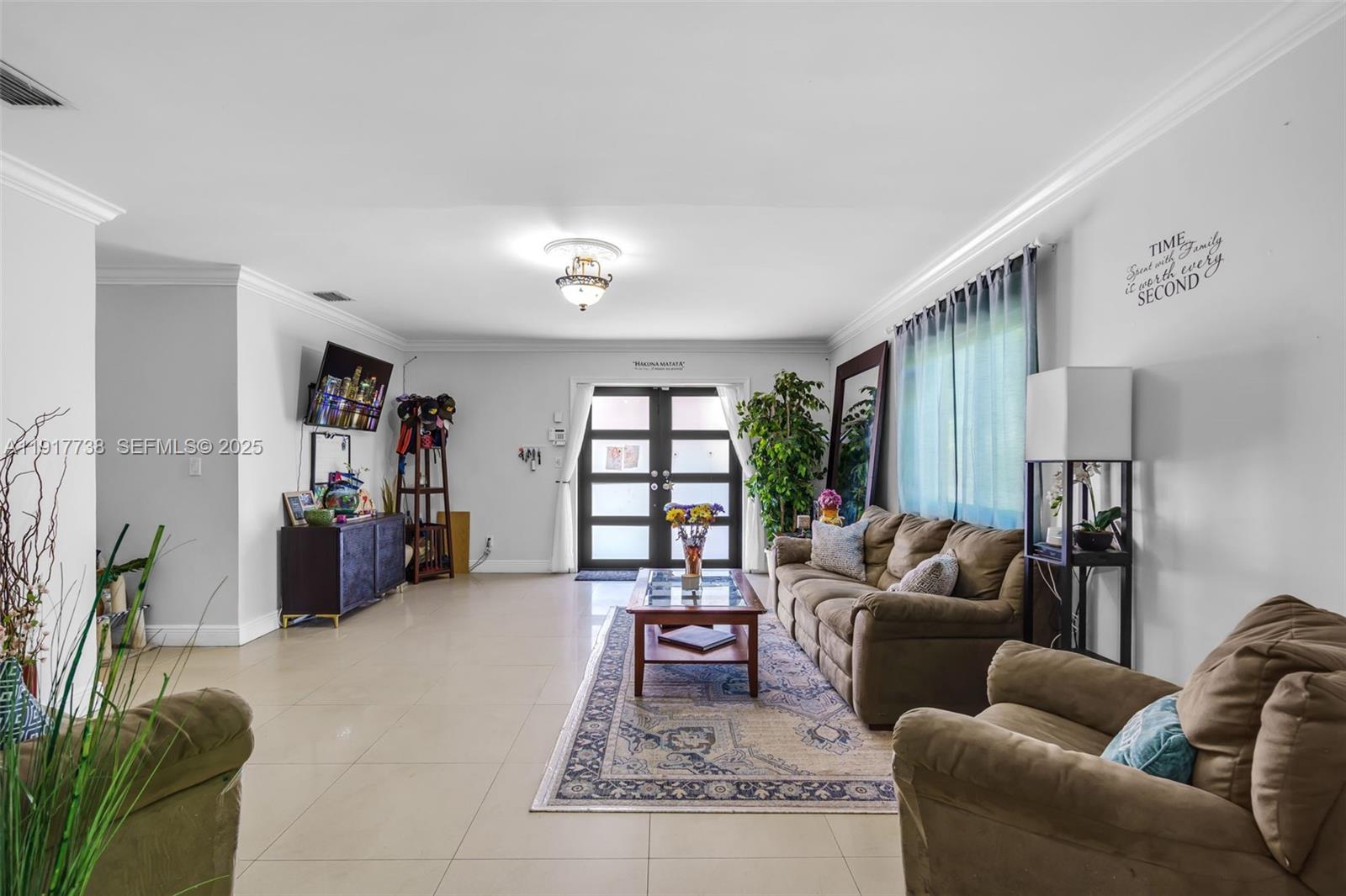 3135 Southwest 80th Avenue Miami, FL 33155 - Photo 9 of 65 a living room with furniture and a couch