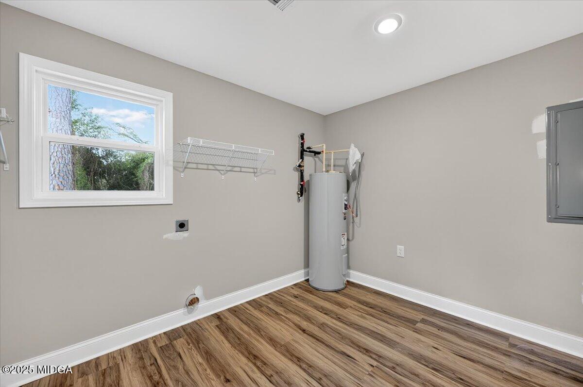 315 Lee Street Perry, GA 31069 - Photo 12 of 26 a view of empty room with wooden floor