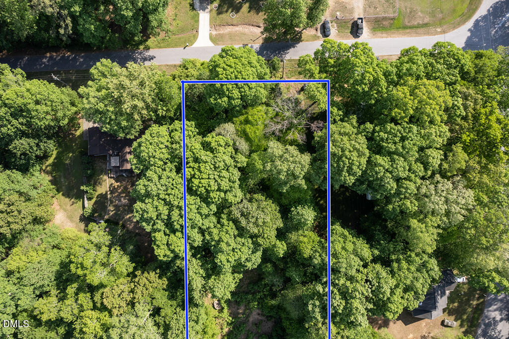 5809 Meadowlark Lane Raleigh, NC 27610 - Photo 2 of 14 an aerial view of a house with a yard and outdoor space