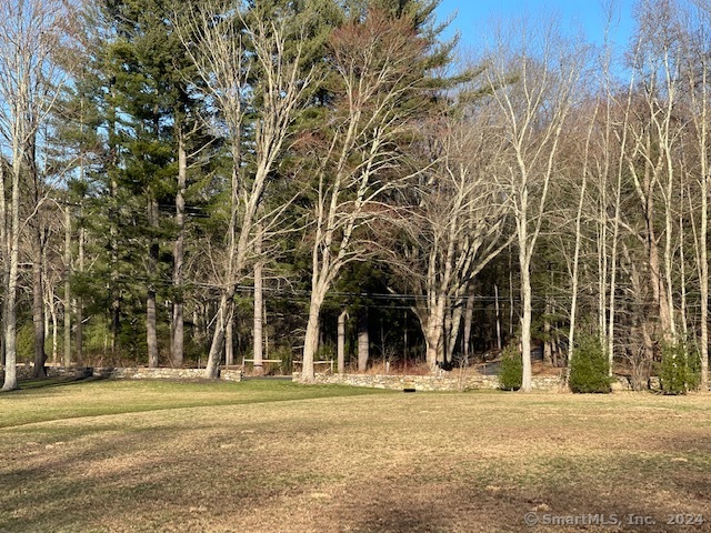 90 Redding Road Easton, CT 06612 - Photo 16 of 32 a view of a building with a trees
