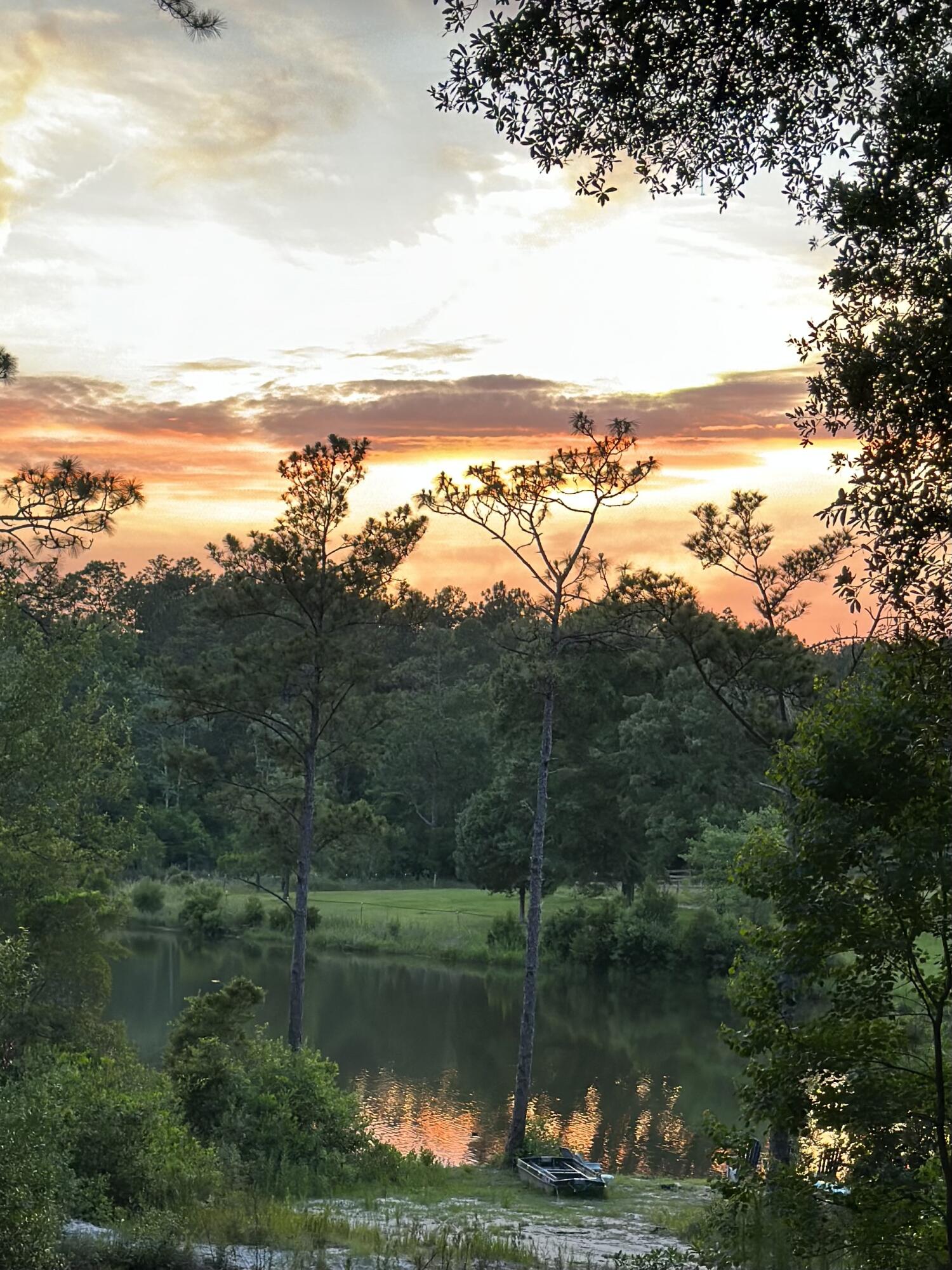 1111 Tallokas Road Crestview, FL 32536 - Photo 2 of 56 a view of lake with green space