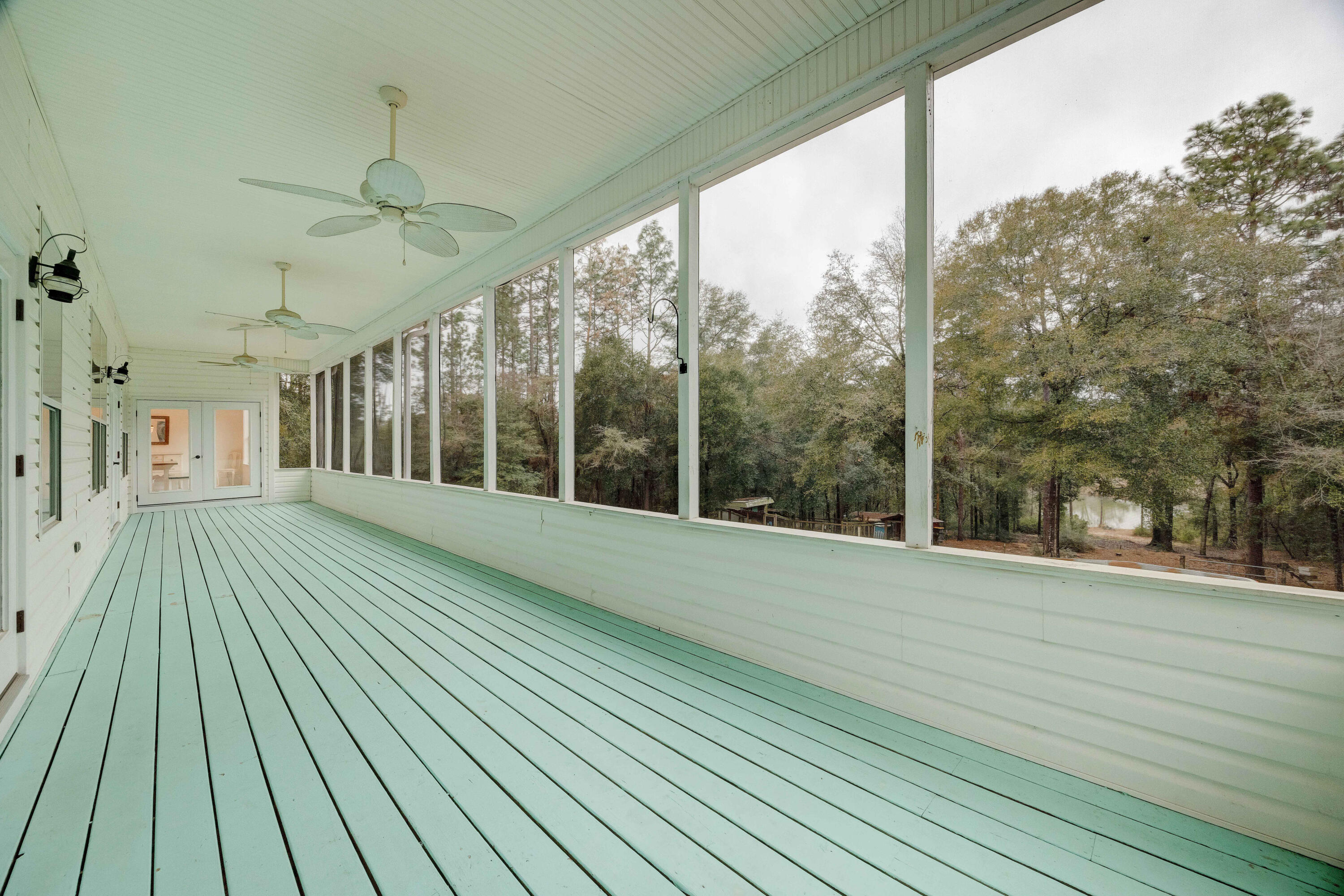 1111 Tallokas Road Crestview, FL 32536 - Photo 34 of 56 a view of outdoor space with deck