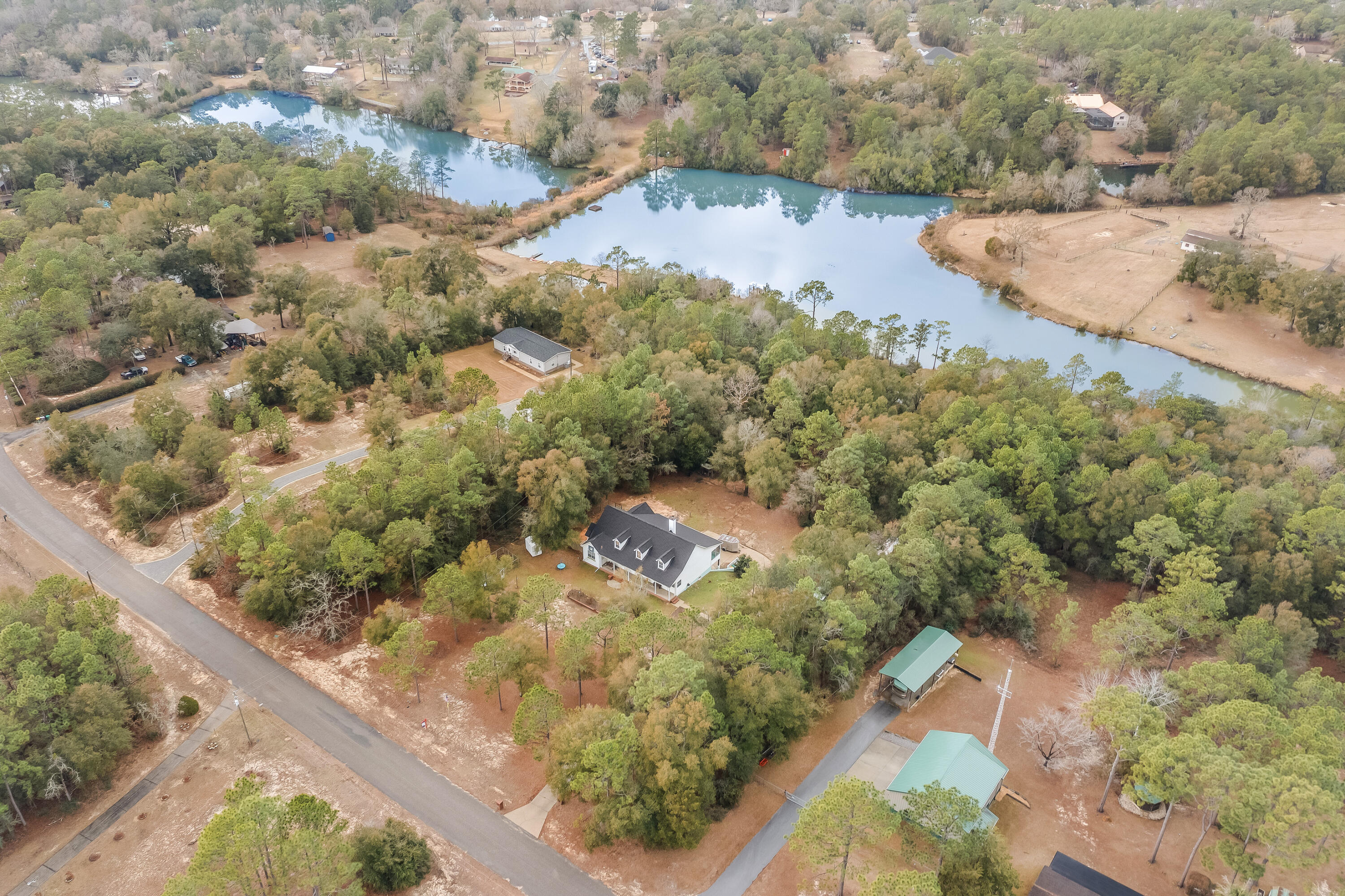 1111 Tallokas Road Crestview, FL 32536 - Photo 41 of 56 a view of a yard with an outdoor space
