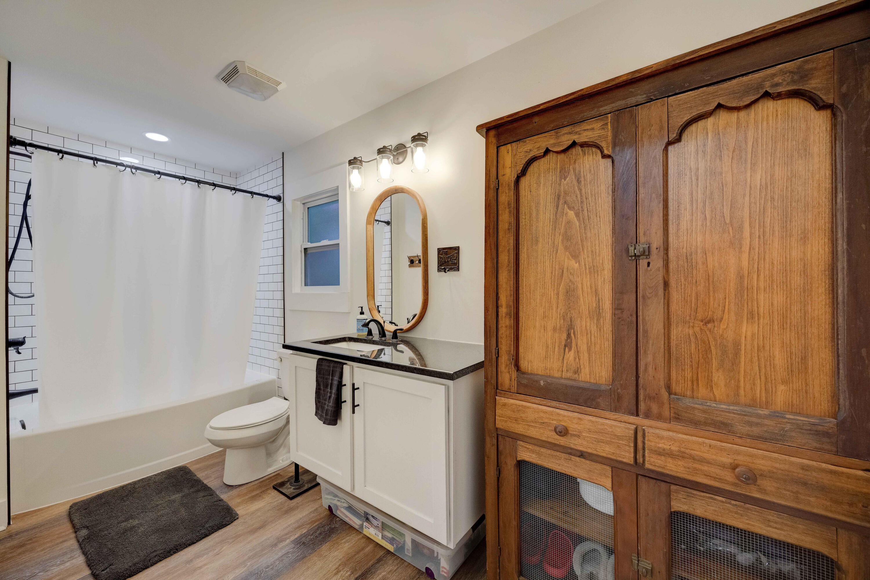1111 Tallokas Road Crestview, FL 32536 - Photo 54 of 56 a bathroom with a granite countertop sink toilet and shower