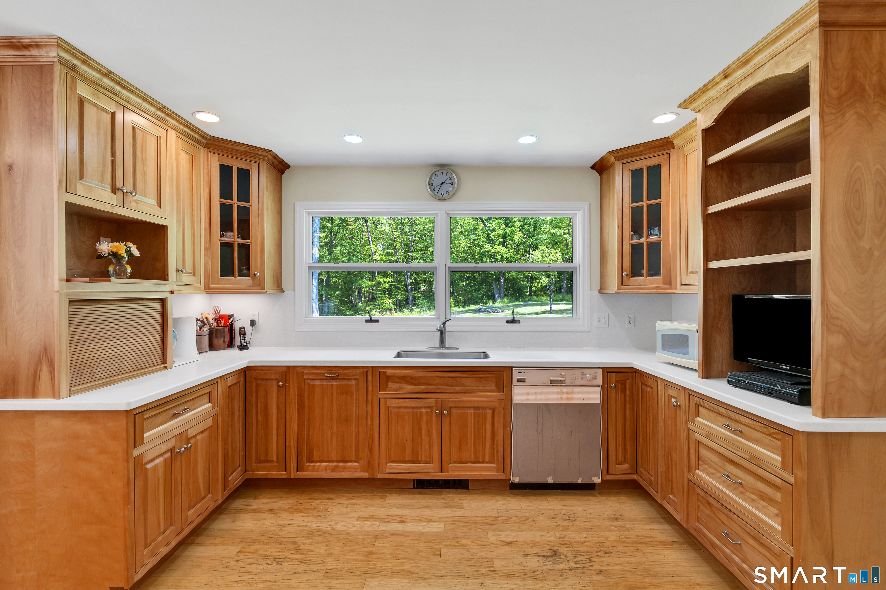 30 Maltbie Road Newtown, CT 06470 - Photo 16 of 40 a large kitchen with stainless steel appliances granite countertop a stove and a sink