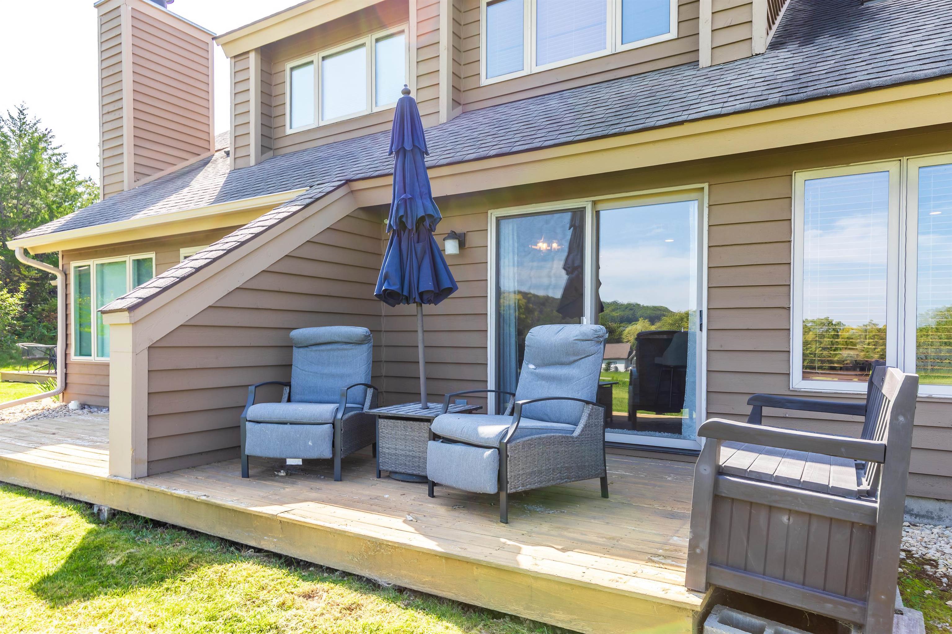 26 Poplar Ridge Galena, IL 61036 - Photo 50 of 55 a view of a patio with couches chairs and potted plants
