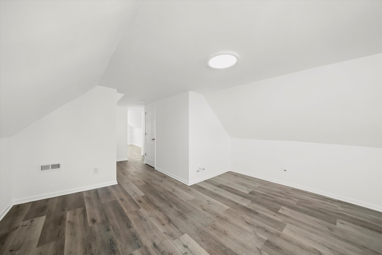 2510 North Linder Avenue Chicago, IL 60639 - Photo 13 of 30 a view of a room with wooden floor