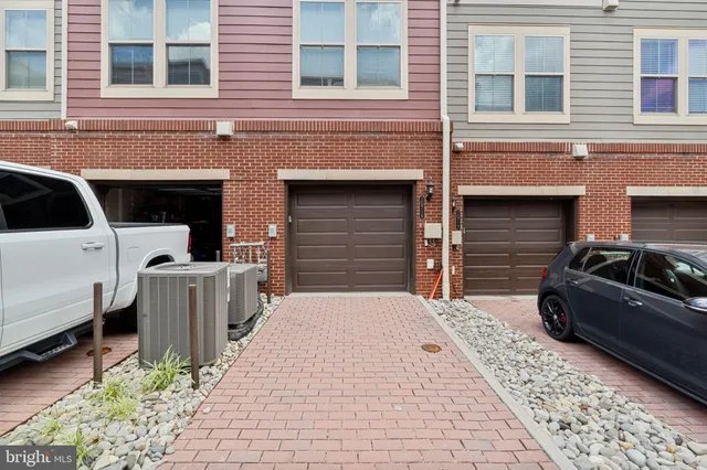 an aerial view of a house with outdoor space