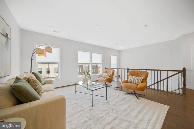 a living room with furniture and a couch