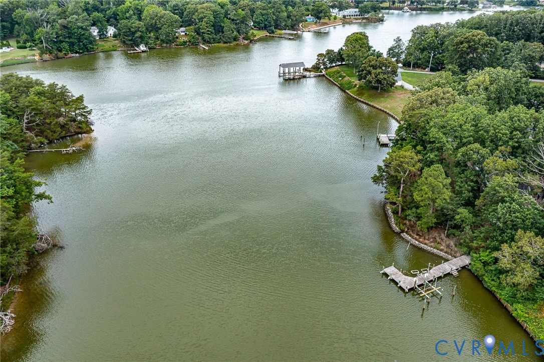 142 Bridge Lane Reedville, VA 22539 - Photo 24 of 56 an aerial view of residential houses with outdoor space and lake view