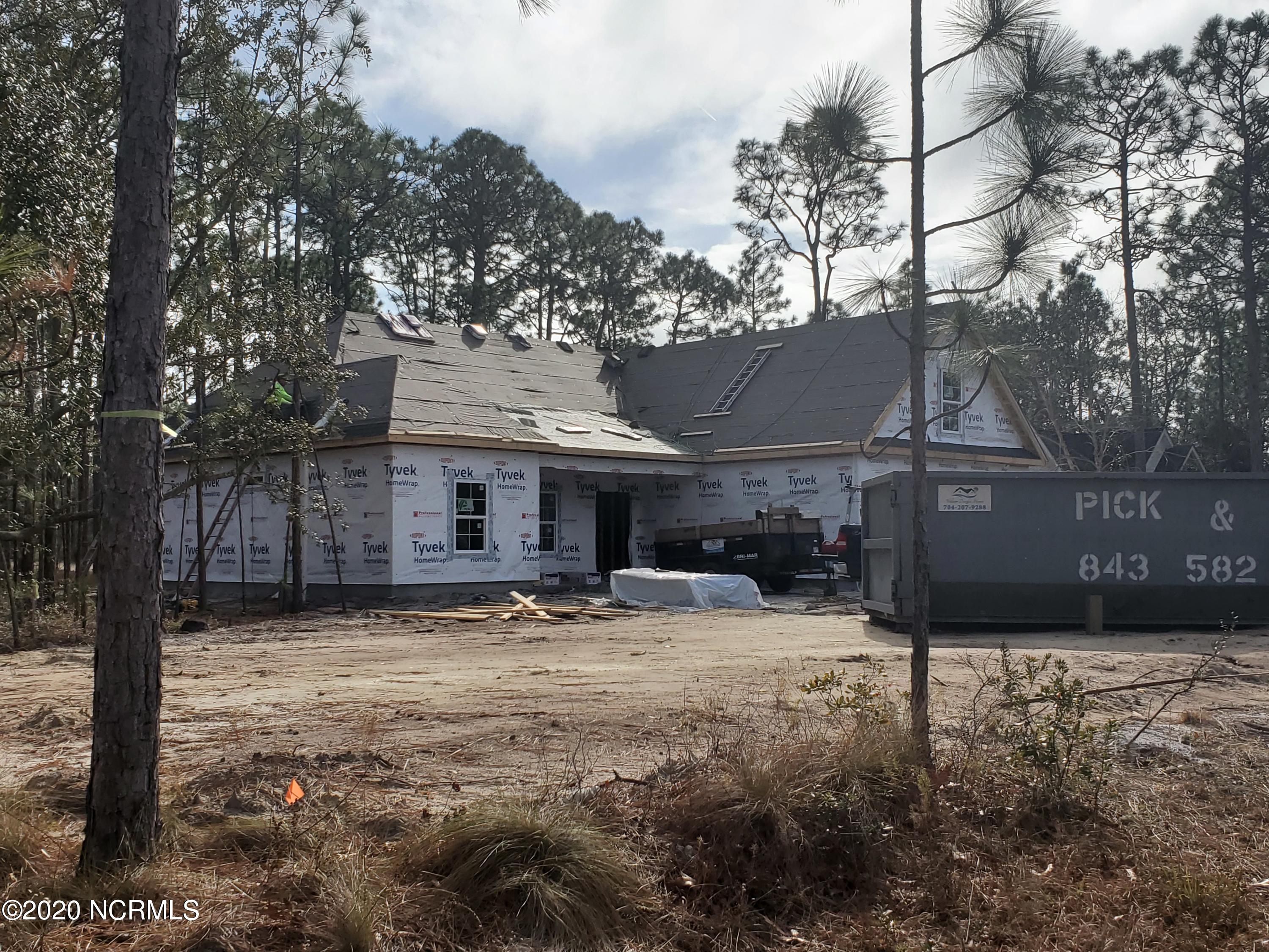 898 Boros Road Boiling Spring Lakes, NC 28461 - Photo 2 of 16 The roof is under way!