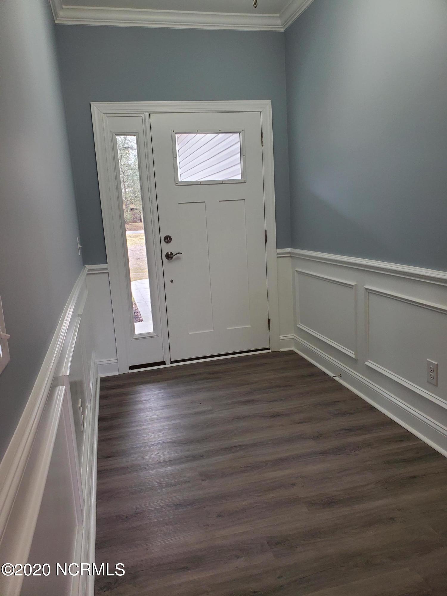 898 Boros Road Boiling Spring Lakes, NC 28461 - Photo 5 of 16 Wainscoting in entry standard