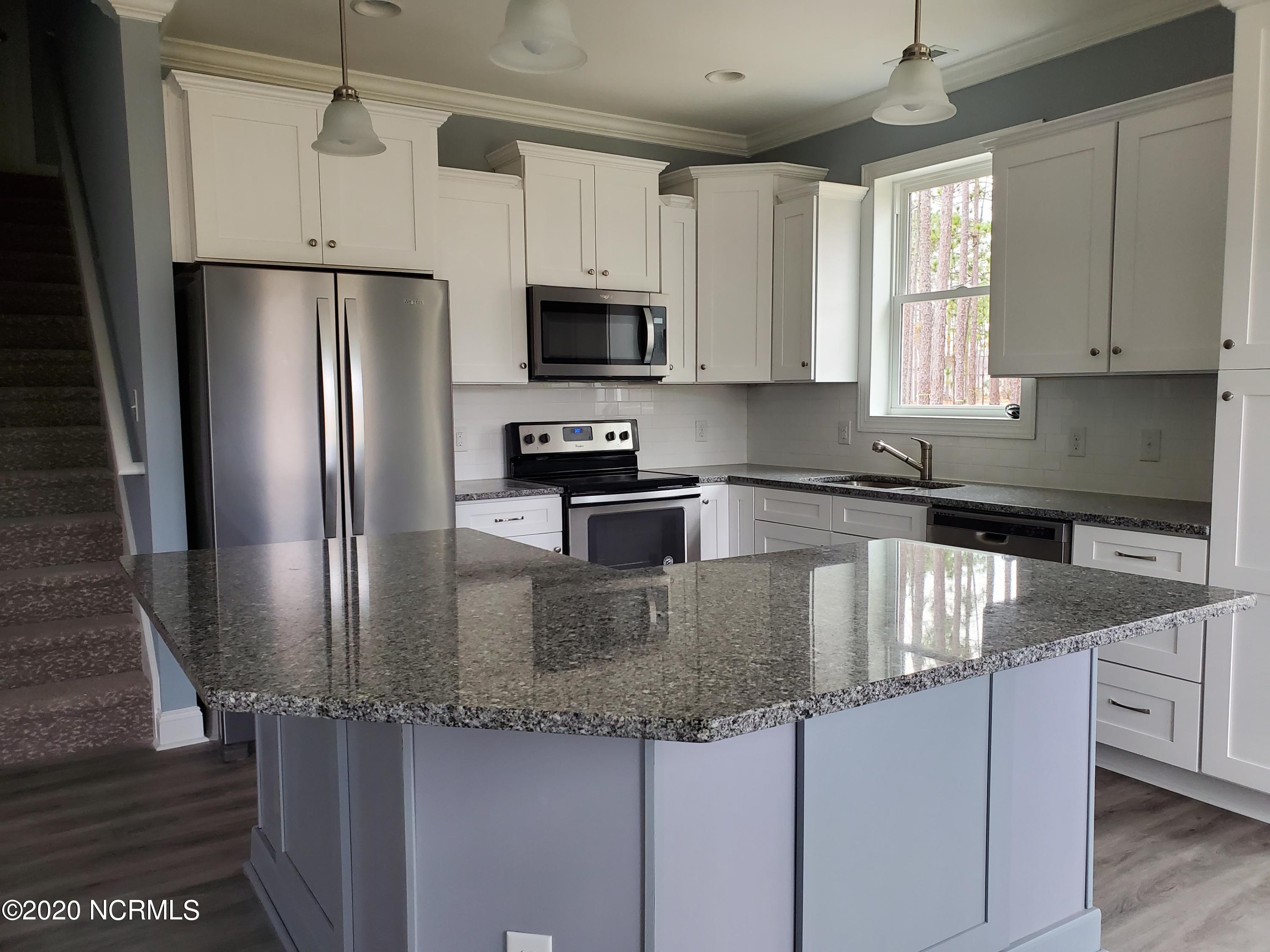 898 Boros Road Boiling Spring Lakes, NC 28461 - Photo 7 of 16 Standard kitchen with granite lvl 1