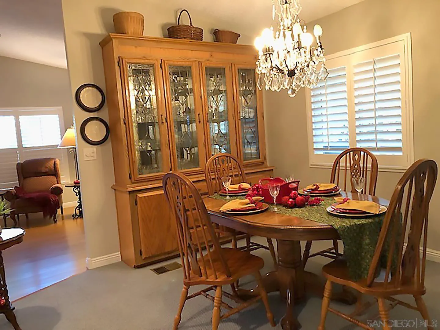 3367 Don Pablo Drive Carlsbad, CA 92010 - Photo 7 of 25 a view of a dining room with furniture and chandelier