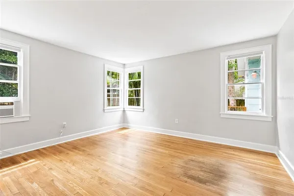 a view of an empty room with a window