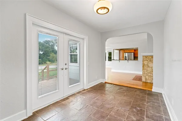 a view of an empty room and window