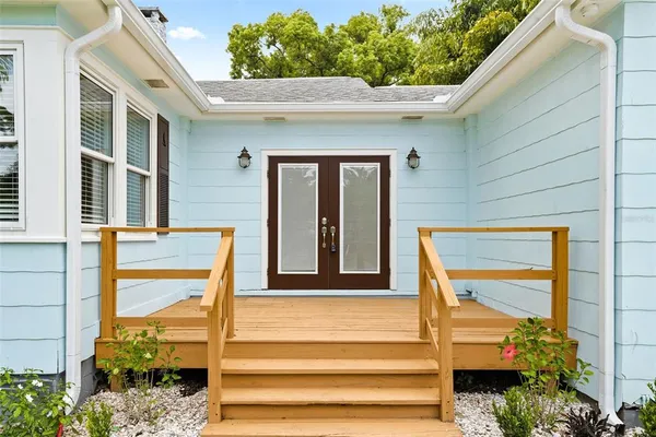 a front view of a house with a porch