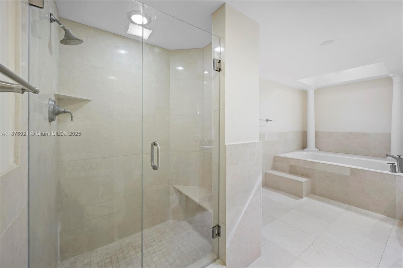 20191 East Country Club Drive, Unit TS8 Aventura, FL 33180 - Photo 13 of 27 a bathroom with a bathtub and a shower
