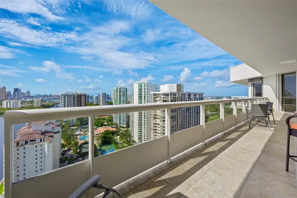 a view of a balcony with city view