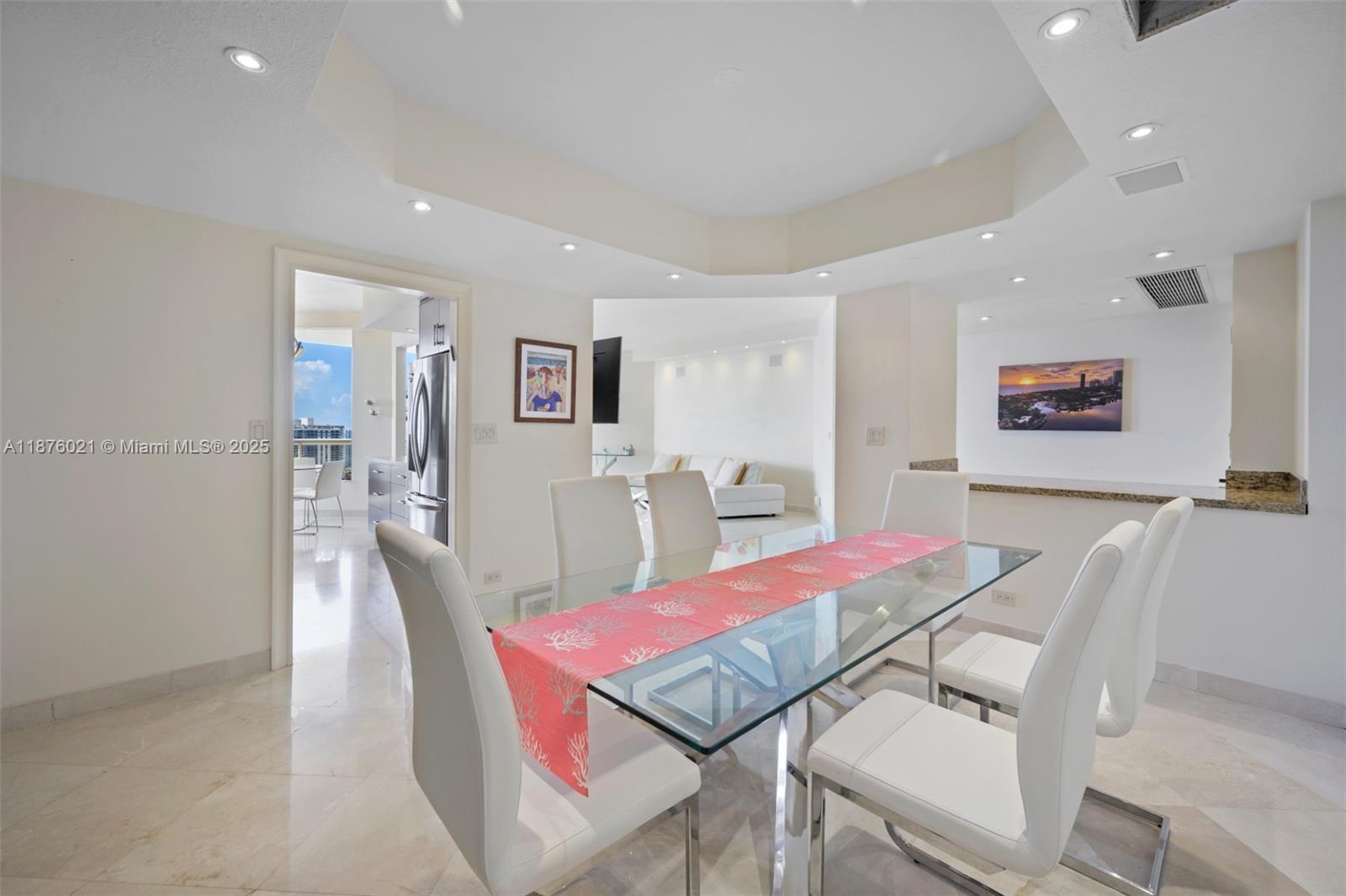 20191 East Country Club Drive, Unit TS8 Aventura, FL 33180 - Photo 5 of 27 a view of a dining room with furniture