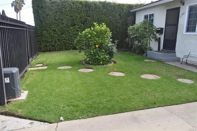 a view of a backyard with a garden