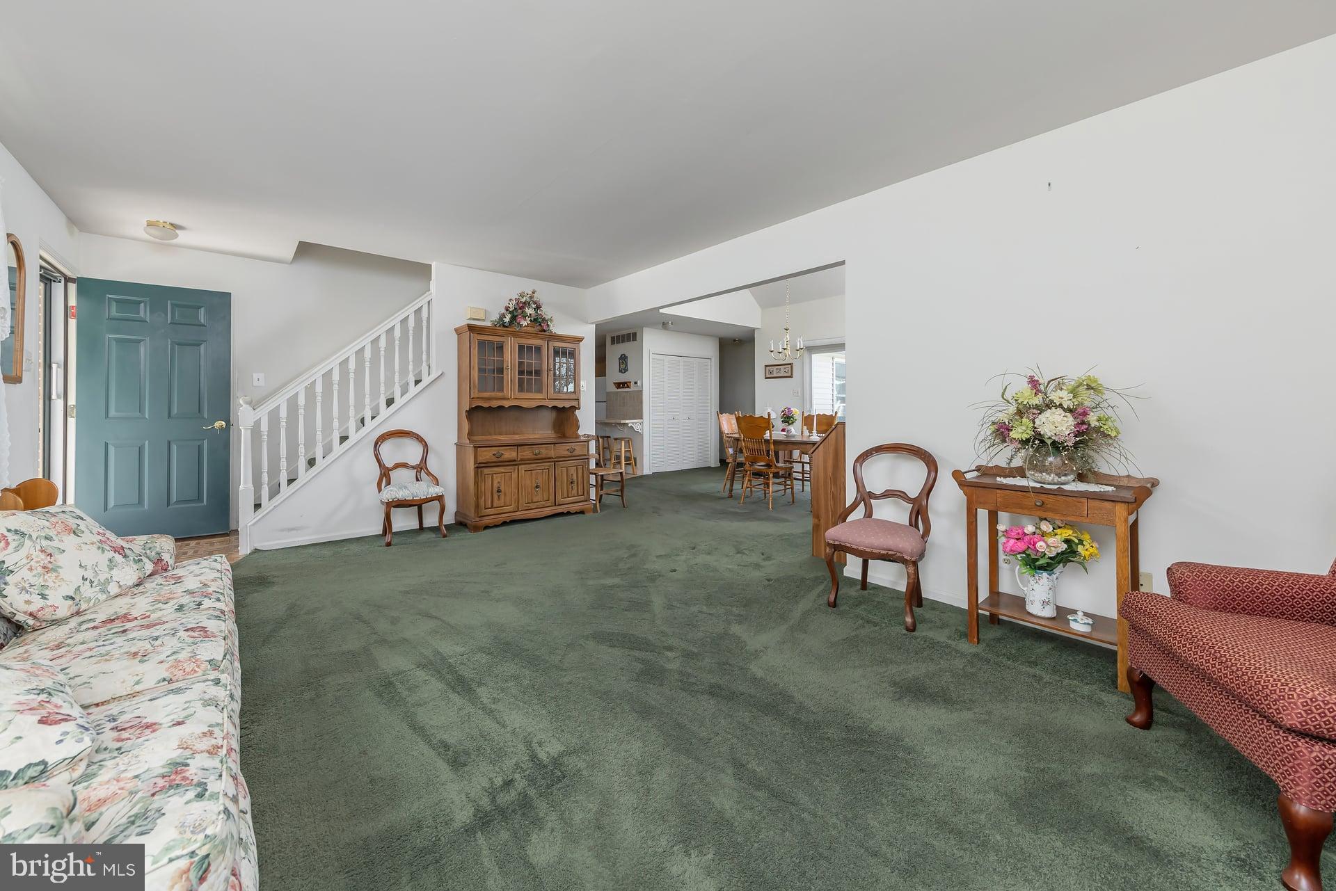 423 Country Way Mickleton, NJ 08056 - Photo 4 of 19 a view of a livingroom with furniture and windows
