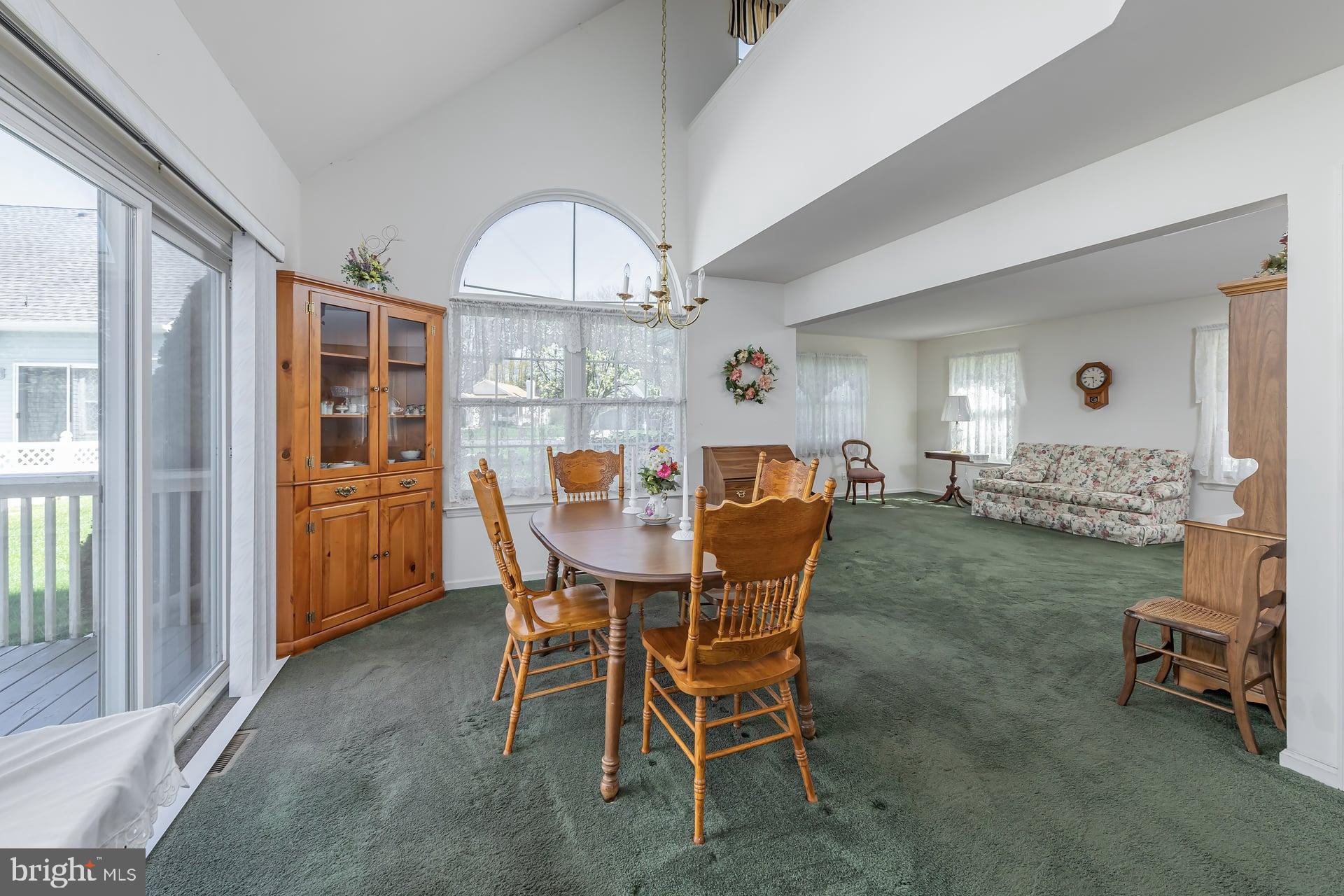 423 Country Way Mickleton, NJ 08056 - Photo 6 of 19 a view of a dining room with furniture and chandelier