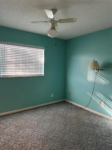 a view of a room with windows