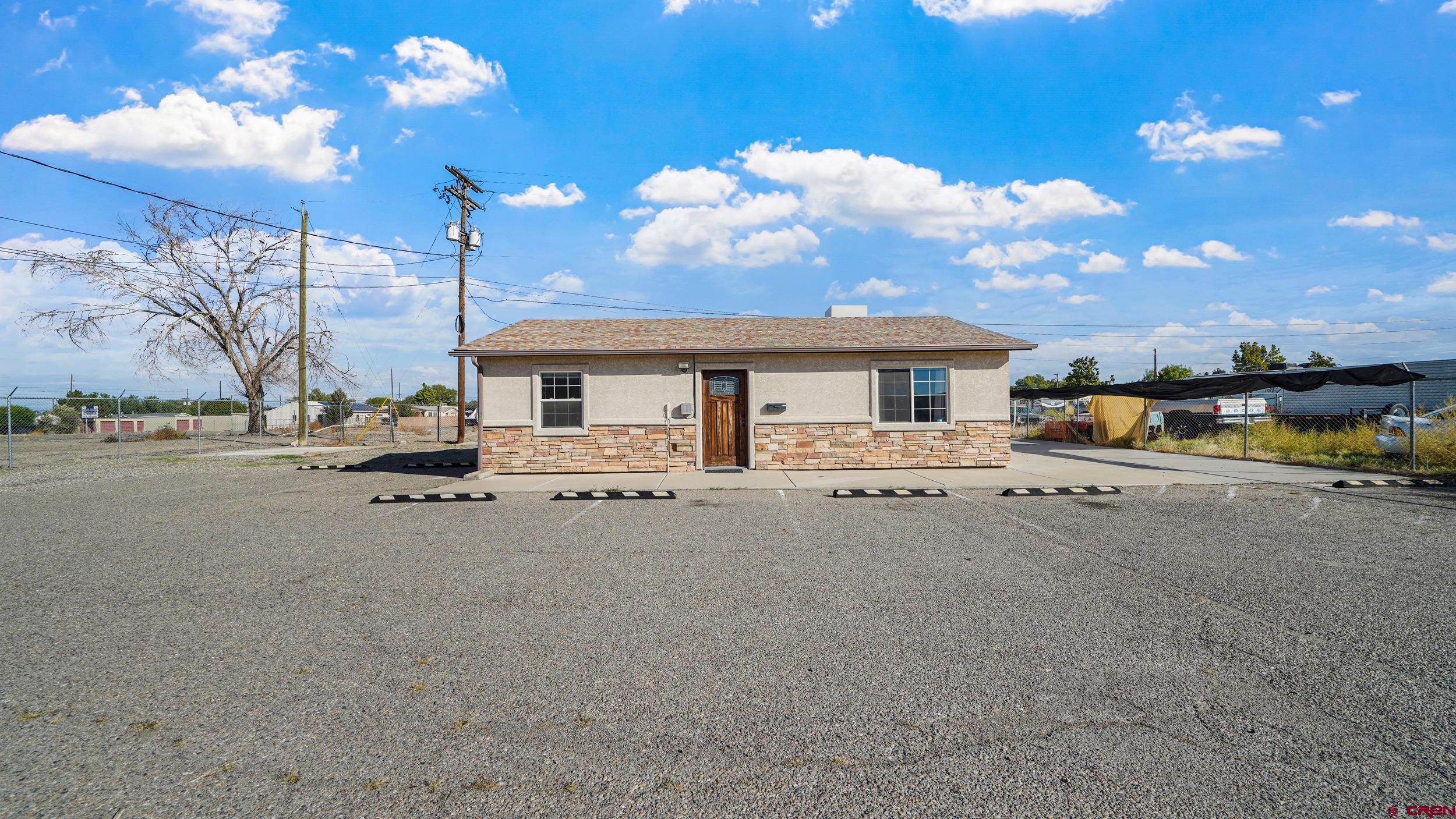 743 Highway 6&50 Fruita, CO 81521 - Photo 17 of 26 a view of a house with backyard and sitting area