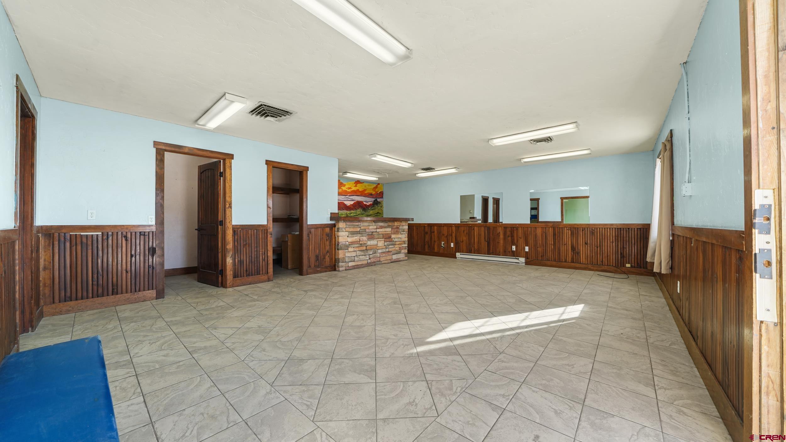 743 Highway 6&50 Fruita, CO 81521 - Photo 21 of 26 a living room with furniture and a wooden floor
