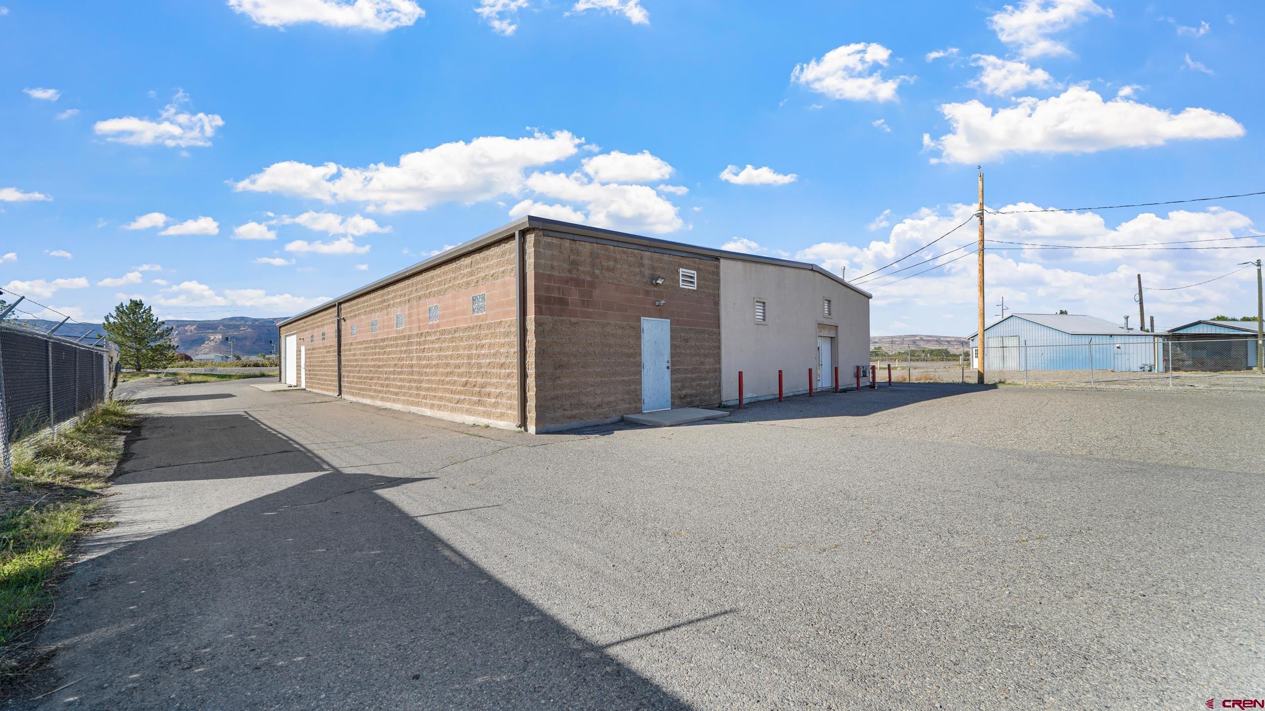 743 Highway 6&50 Fruita, CO 81521 - Photo 6 of 26 a view of a house with a backyard and garden