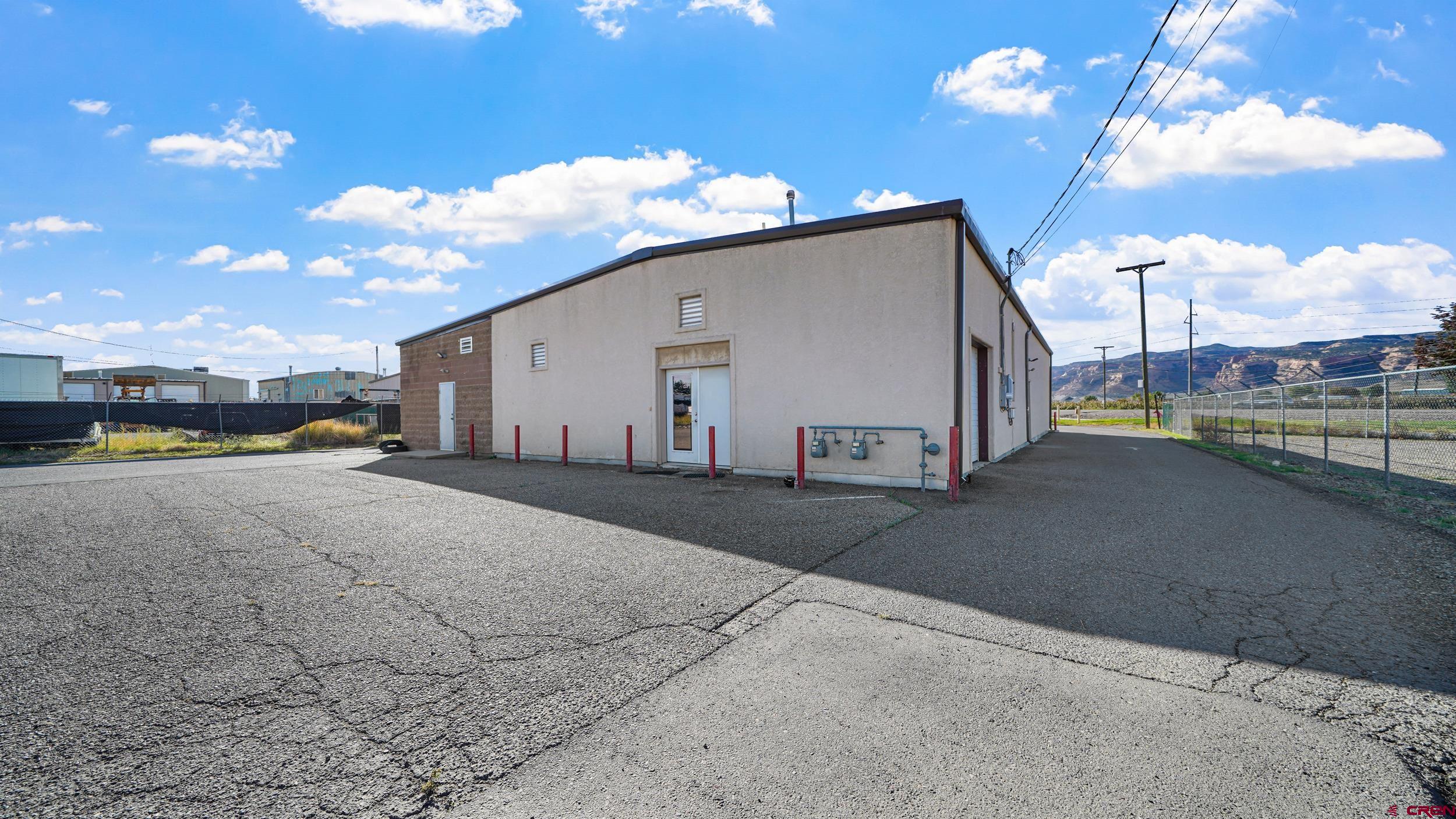 743 Highway 6&50 Fruita, CO 81521 - Photo 7 of 26 a view of a house with a yard