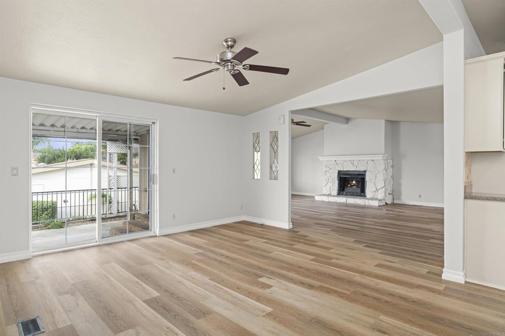 909 Richland Road, Unit 84 San Marcos, CA 92069 - Photo 13 of 35 a view of empty room with wooden floor and fan
