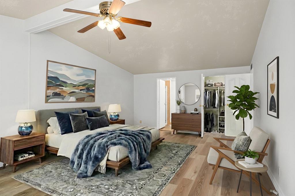 909 Richland Road, Unit 84 San Marcos, CA 92069 - Photo 22 of 35 a bedroom with furniture and a large window