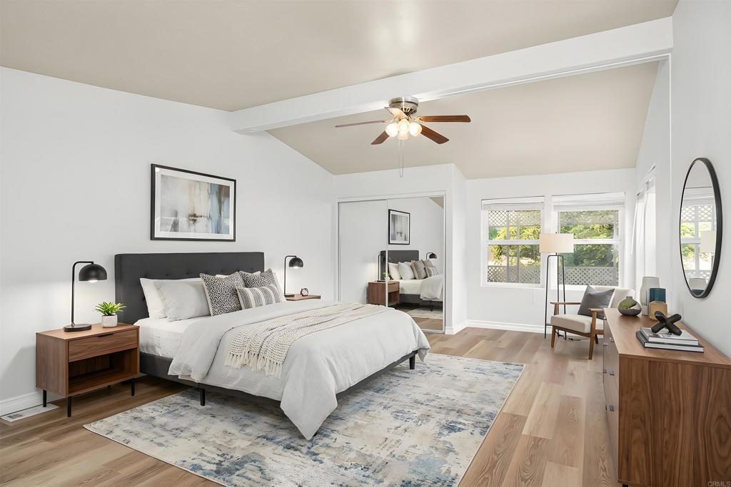 909 Richland Road, Unit 84 San Marcos, CA 92069 - Photo 24 of 35 a bedroom with a large bed and a window