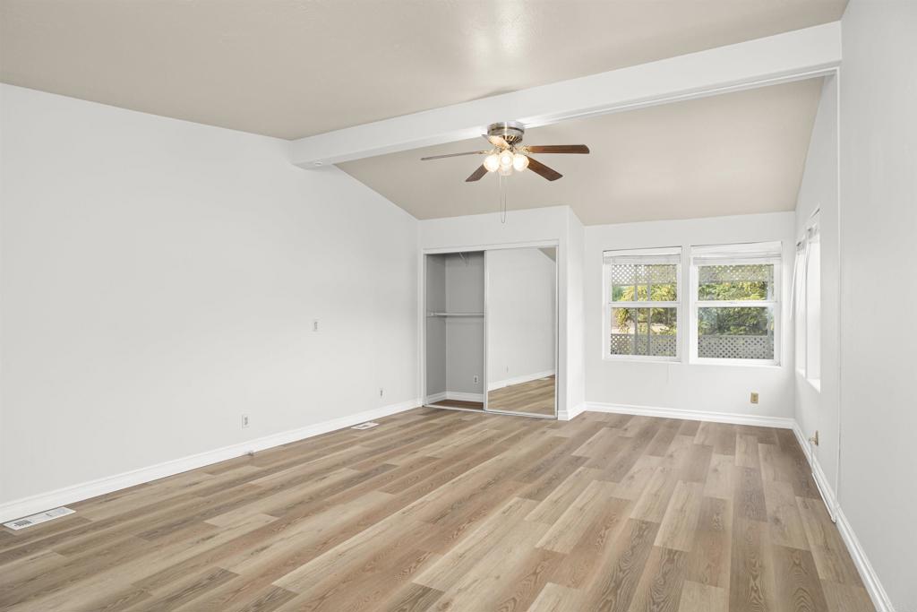 909 Richland Road, Unit 84 San Marcos, CA 92069 - Photo 25 of 35 a view of empty room with wooden floor and fan