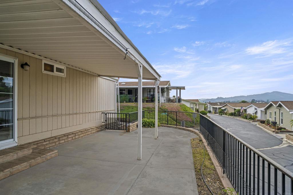 909 Richland Road, Unit 84 San Marcos, CA 92069 - Photo 34 of 35 a view of a chair and tables in the balcony