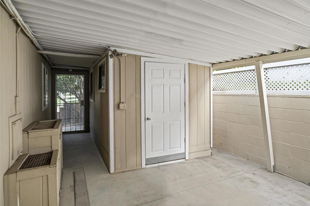 909 Richland Road, Unit 84 San Marcos, CA 92069 - Photo 4 of 35 an entryway at an empty room
