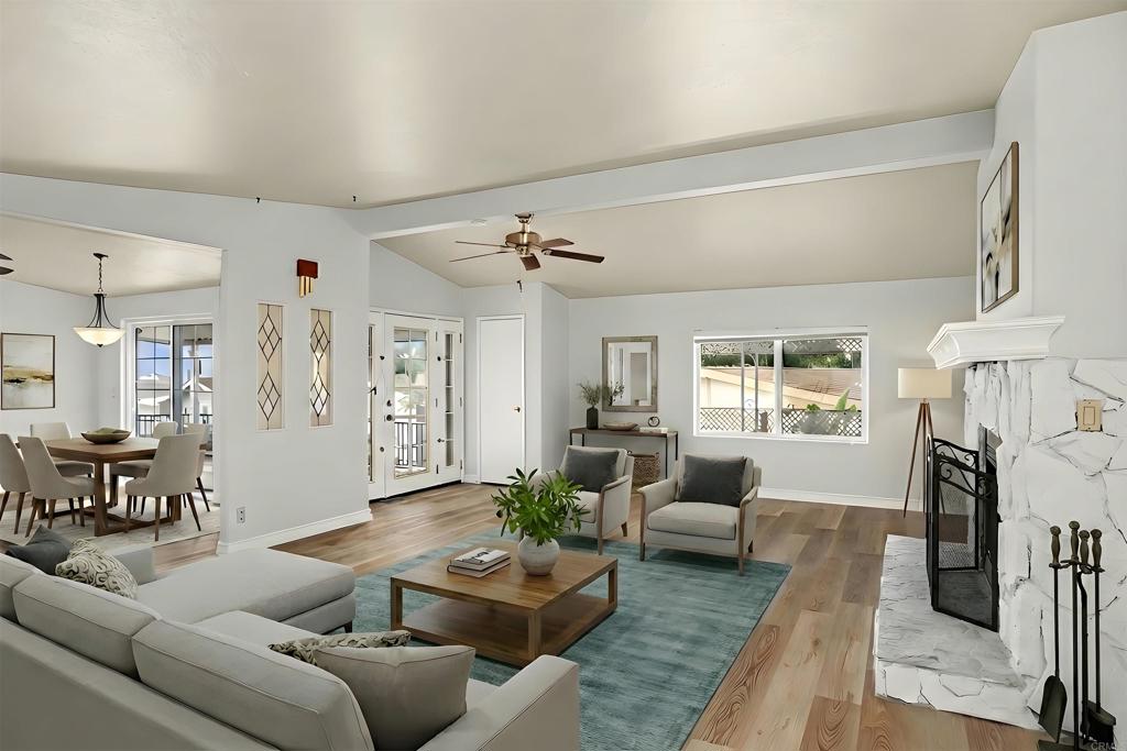909 Richland Road, Unit 84 San Marcos, CA 92069 - Photo 5 of 35 a living room with furniture and a large window