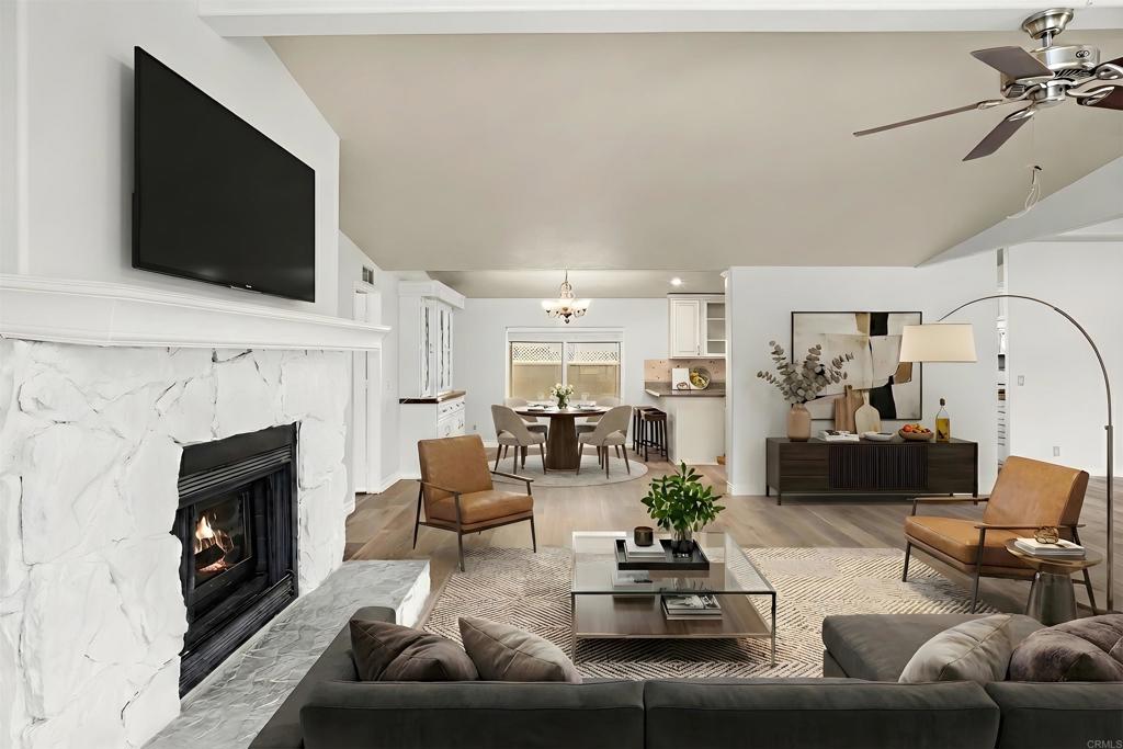 909 Richland Road, Unit 84 San Marcos, CA 92069 - Photo 9 of 35 a living room with furniture fireplace and flat screen tv