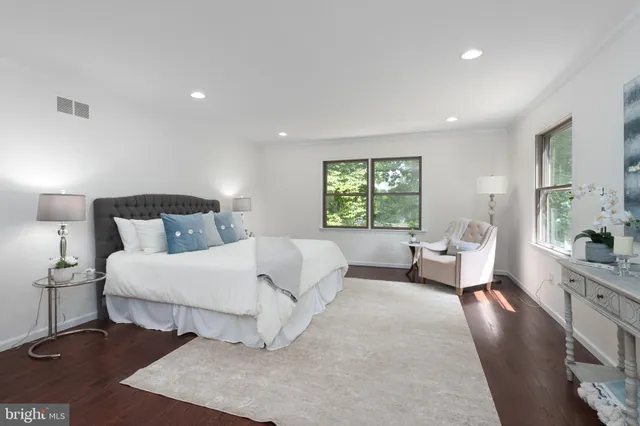 a bed room with a bed and a couch