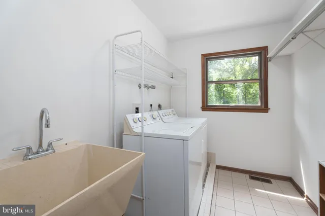 a bathroom with a sink and a bathtub